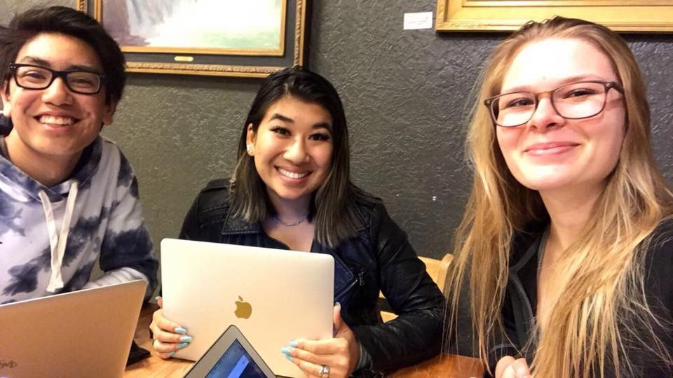 Several members of the People for Unity group working out the details of the upcoming march. (Pictured left to right; Will Tanguy, Colette Raptosh, Madeleine McLean.)