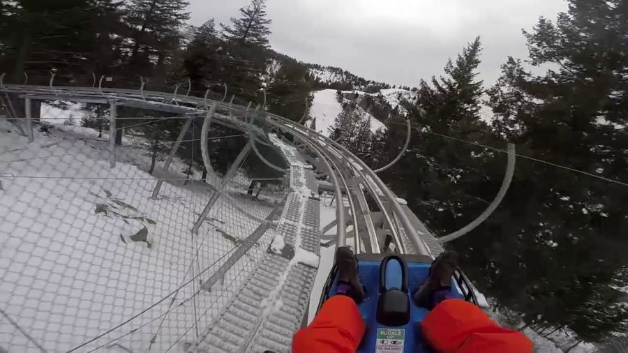 A snapshot of an enthusiastic snow goer as he videos his experience riding the Bogus Basin Glade Runner.  