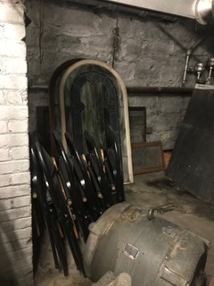 The stain glass windows and coal furnaces, sealed away in the basement. (McKenna Johnson)