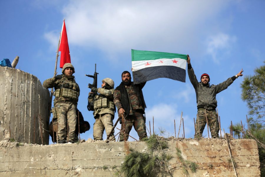 Turkish forces and free syrian army members on mount barsaya
Photo credit by khalil ashawi/reuters
