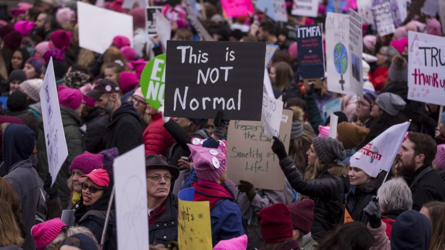 A crowd of marchers gathering at the 2020 Women’s March (Getty Images).