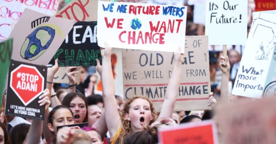 Students protesting and calling for their government to take action against climate change. (Mark Metcalfe/Getty Images)