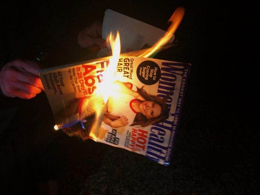 A+magazine+with+a+dieting+advertisement+on+the+cover+being+burned+to+represent+destroying+the+dangerous+ideals+that+dieting+culture+creates.+%28Bella+Rock%29