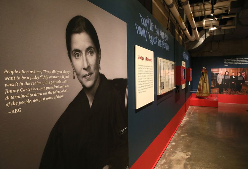 Large scale photos and quotes from RBG kept up in the Notorious RBG exhibit, now being used to honor her memory. (Stacey Wescott / Chicago Tribune)