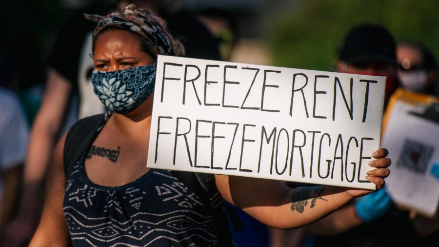 A protester calls for the government to halt payment on rent and mortgage during a demonstration in Minneapolis. BRANDON BELL / GETTY IMAGES