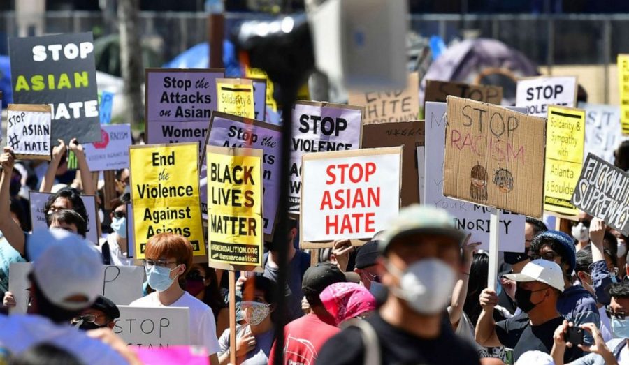 A group rallying against anti-Asian American and Pacific Islander sentiment and hate at City Hall in Los Angeles. (Frederic Brown/ Getty Images)