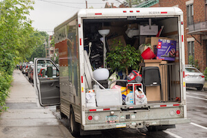 A moving van filled with the contents of what once was home (move.org)