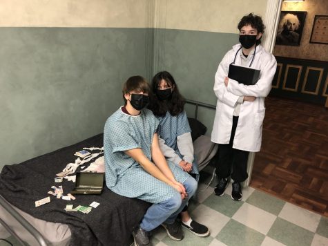 (from right to left) August Mayton, Moesha Aplicano-Burnham, and Ryan Kelley after successfully completing the most difficult room, Asylum, with a lot of help from the staff’s hints. (Nick from Clockwise Escape Room)
