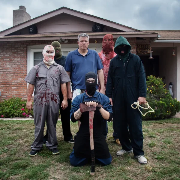 The actors of McKamey Manor stand outside before a haunted tour.

