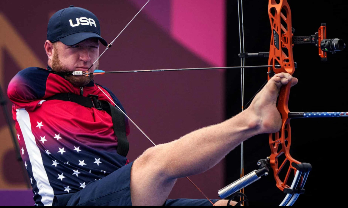 Matt Stutzman using his toes to shoot an arrow at the 2020 Tokyo paralympic games. 